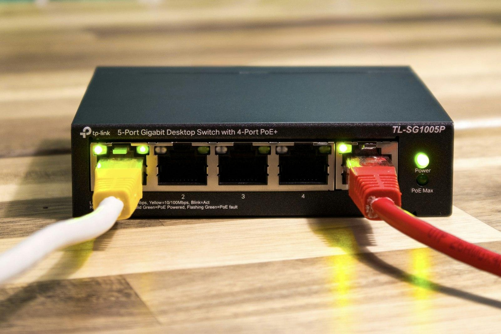Technician connecting network cabling